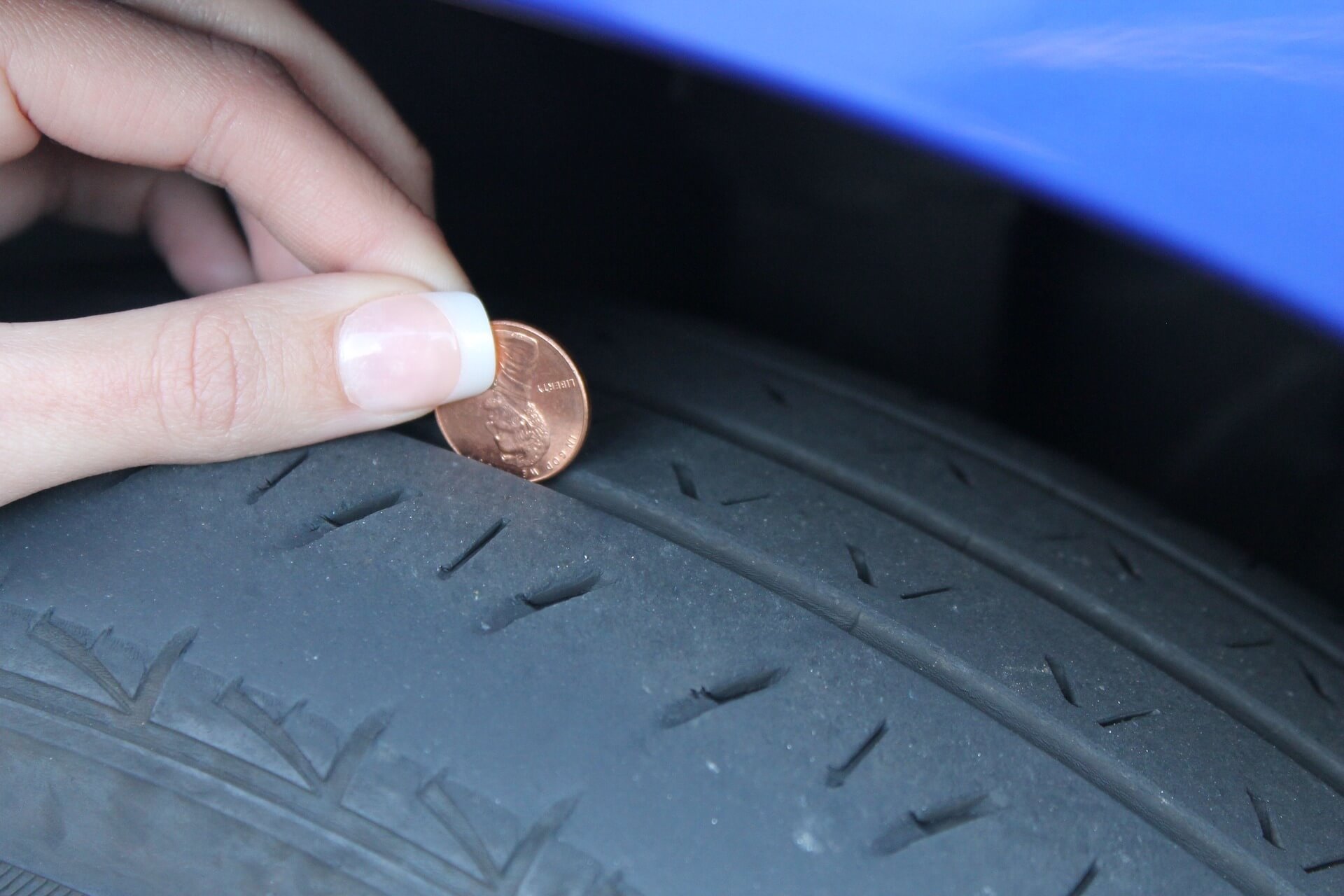 Use a penny to see if your tire is bald.